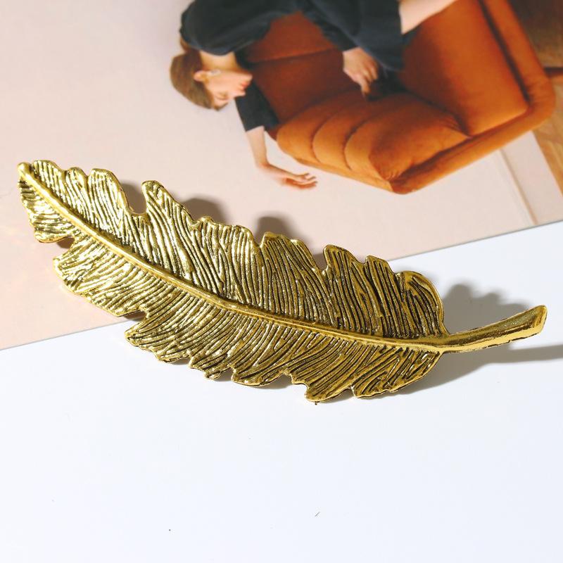 Broche Pluma