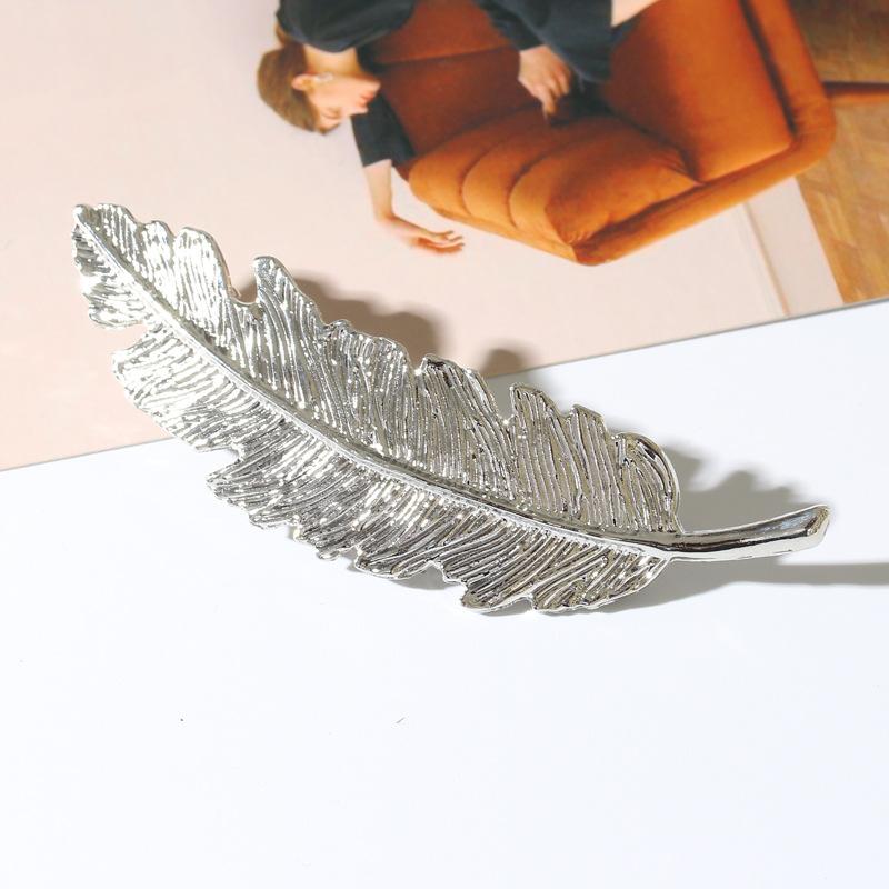 Broche Pluma